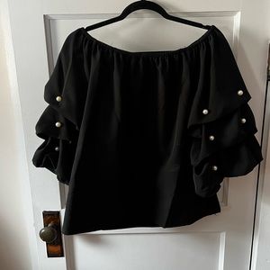 Black off shoulder top with pearl details